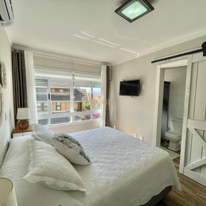 Cobertura com 130m², 2 dormitórios, 1 suíte, 2 vagas no Riviere em Torres para Comprar