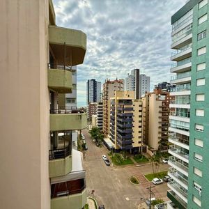 Apartamento com 118m², 3 dormitórios, 1 suíte, 2 vagas no Splendor em Torres para Comprar