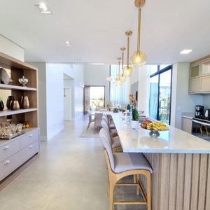 Casa de Condomínio com 350m², 3 dormitórios, 3 suítes, 2 vagas no Reserva das Águas em Torres para Comprar