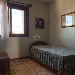 Casa com 338m², 4 dormitórios, 2 suítes, 3 vagas no bairro Centro em Passo de Torres para Comprar