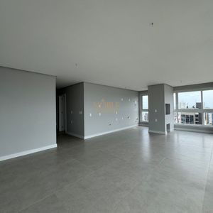 Apartamento com 102m², 3 dormitórios, 1 suíte, 2 vagas no Maui Residencial em Torres para Comprar