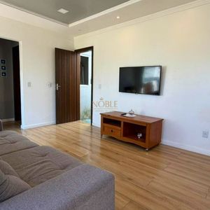 Casa com 120m², 3 dormitórios, 1 suíte, 2 vagas no bairro Loteamento Caravelle em Passo de Torres para Comprar