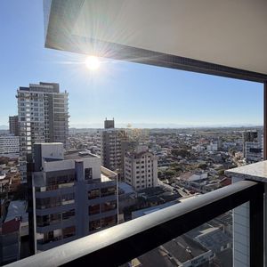 Apartamento com 92m², 2 dormitórios, 1 suíte, 2 vagas no Più Belle Residencial em Torres para Comprar