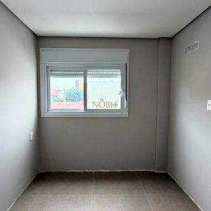 Apartamento com 70m², 2 dormitórios, 1 suíte, 1 vaga no Topazio em Torres para Comprar