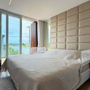 Casa com 258m², 4 dormitórios, 4 suítes, 2 vagas no Reserva das Águas em Torres para Comprar