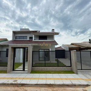 Casa com 284m², 4 dormitórios, 1 suíte, 2 vagas no bairro Igra Sul em Torres para Comprar