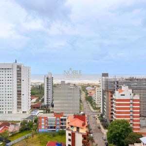 Apartamento com 107m², 2 dormitórios, 2 suítes, 2 vagas no Ibiza em Torres para Comprar