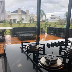 Casa de Condomínio com 275m², 3 dormitórios, 3 suítes, 2 vagas no Ocean Side em Torres para Comprar