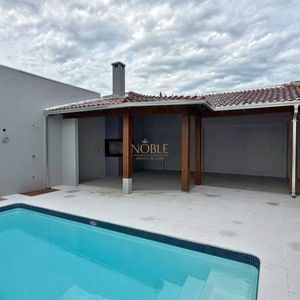 Casa com 284m², 4 dormitórios, 1 suíte, 2 vagas no bairro Igra Sul em Torres para Comprar