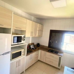Casa com 240m², 4 dormitórios, 2 suítes, 2 vagas no bairro Praia Paraíso em Torres para Comprar