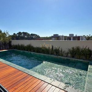 Casa com 335m², 4 dormitórios, 4 suítes, 2 vagas no Reserva das Águas em Torres para Comprar