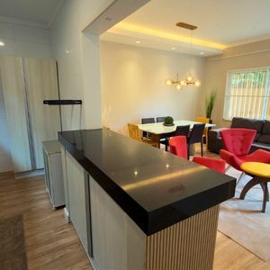 Sobrado com 127m², 3 dormitórios, 1 suíte, 1 vaga no Ilhas Travertino em Torres para Comprar
