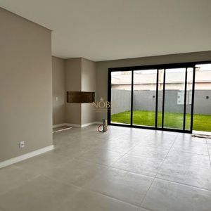 Casa com 140m², 3 dormitórios, 1 suíte, 2 vagas no bairro Morada das Palmeiras em Torres para Comprar