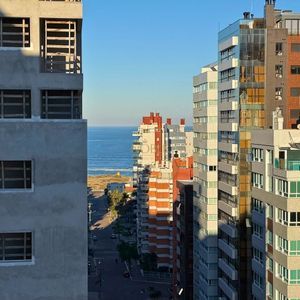 Apartamento com 70m², 2 dormitórios, 1 suíte, 1 vaga no Monet em Torres para Comprar