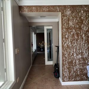 Sobrado com 290m², 4 dormitórios, 1 suíte, 2 vagas no bairro Igra Norte em Torres para Comprar