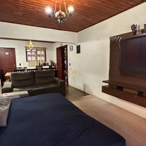 Casa, 3 dormitórios, 2 vagas no bairro Centro em Torres para Comprar