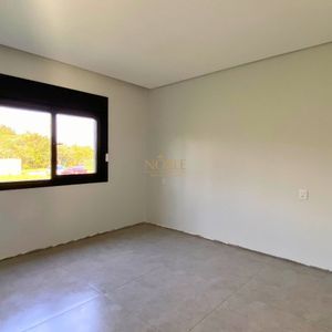 Casa com 201m², 3 dormitórios, 3 suítes, 2 vagas no Reserva das Águas em Torres para Comprar