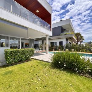 Casa de Condomínio com 348m², 4 dormitórios, 3 suítes, 2 vagas no Condomínio Ilhas Park em Torres para Comprar