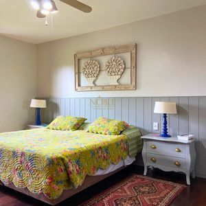 Casa com 518m², 5 dormitórios, 2 suítes, 2 vagas no bairro Praia Grande em Torres para Comprar