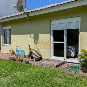Casa, 2 dormitórios, 2 vagas no bairro Igra Norte em Torres para Comprar