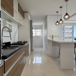 Apartamento com 105m², 3 dormitórios, 2 vagas no Michelângelo em Torres para Comprar