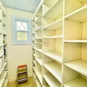 Casa com 243m², 4 dormitórios, 1 suíte, 2 vagas no bairro Stan em Torres para Comprar
