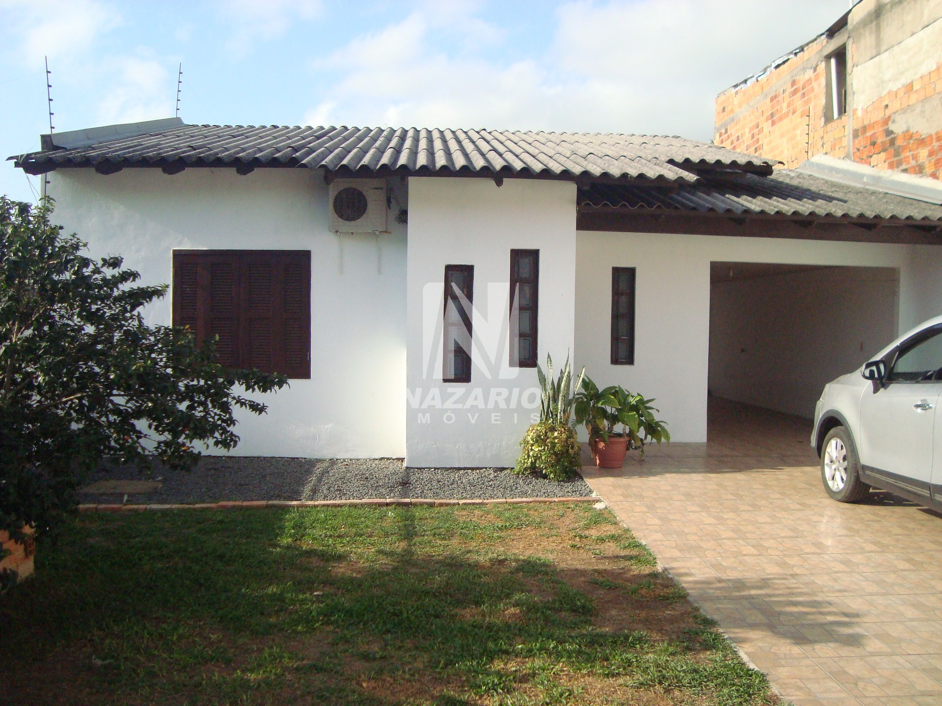 Casa à venda com 3 quartos, 130m² - Foto 1