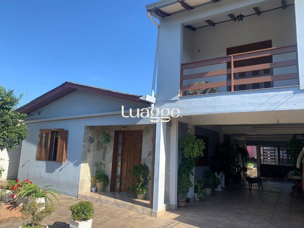 Casa à venda com 4 quartos, 203m² - Foto 1