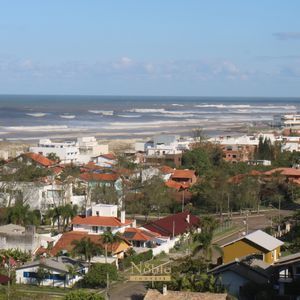 Apartamento com 109m², 3 dormitórios, 1 suíte, 1 vaga no Porto Bello em Torres para Comprar