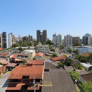 Apartamento com 68m², 2 dormitórios, 1 suíte, 1 vaga no Monet em Torres para Comprar