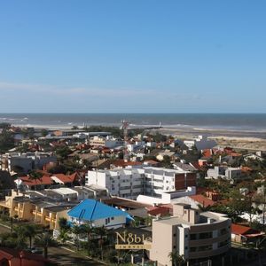 Apartamento com 109m², 3 dormitórios, 1 suíte, 1 vaga no Porto Bello em Torres para Comprar