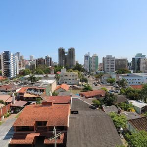 Apartamento com 68m², 2 dormitórios, 1 suíte, 1 vaga no Monet em Torres para Comprar