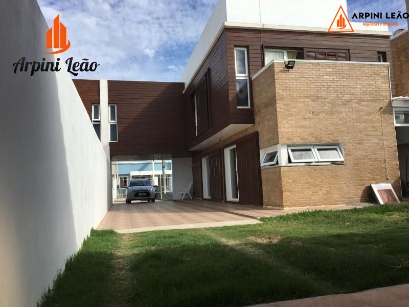 Casa à venda com 3 quartos, 100m² - Foto 1