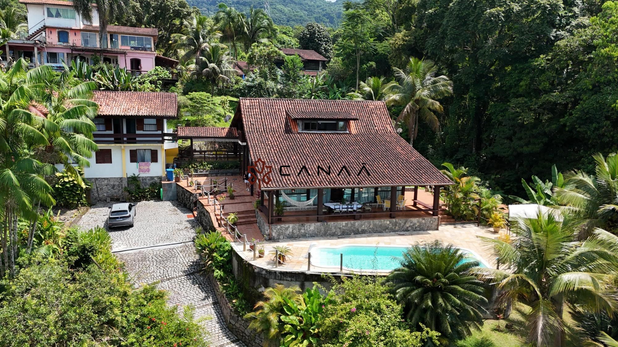 Casa de Condomínio à venda e temporada com 6 quartos, 550m² - Foto 1