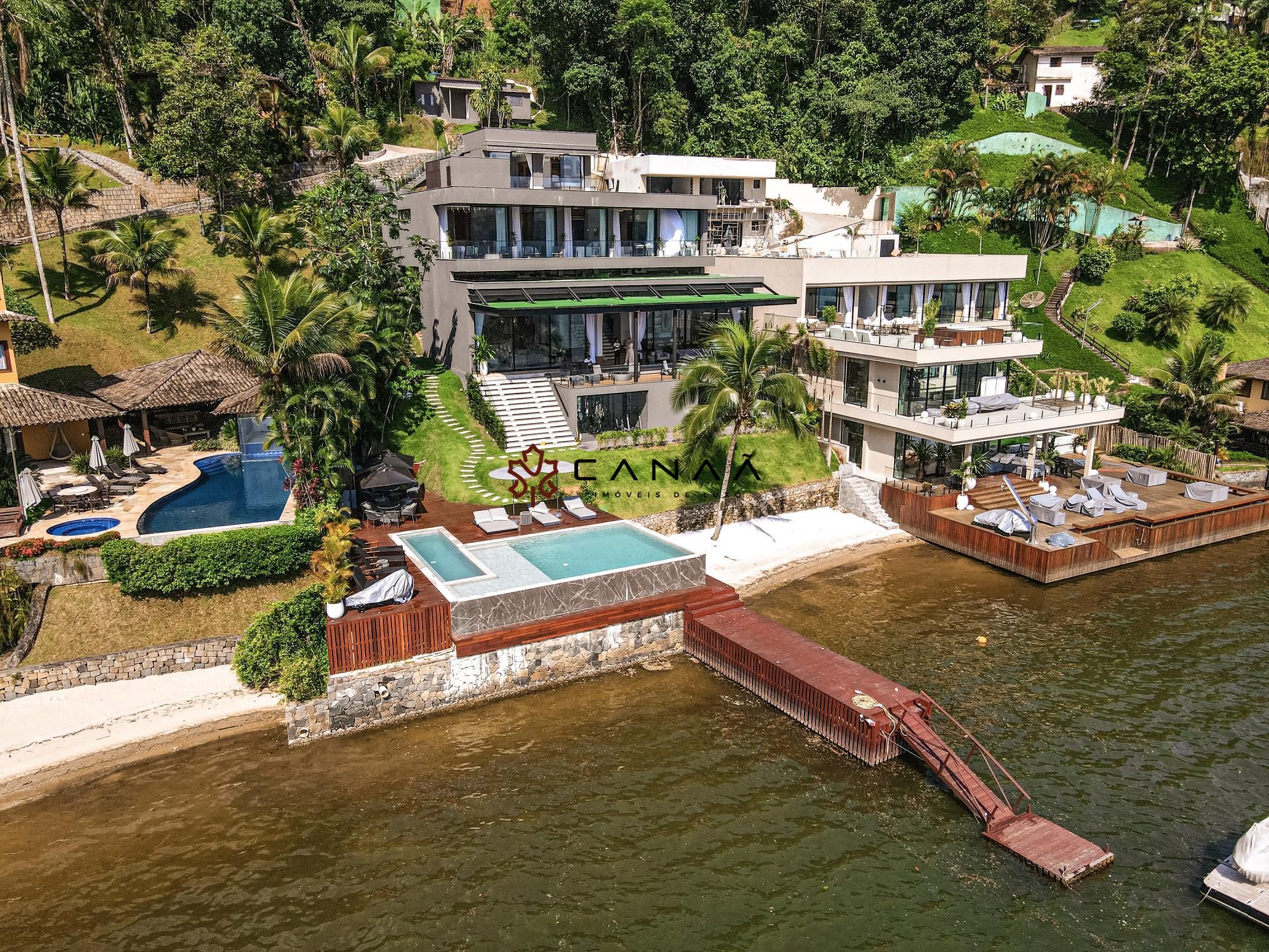 Casa de Condomínio à venda e temporada com 6 quartos, 1000m² - Foto 5