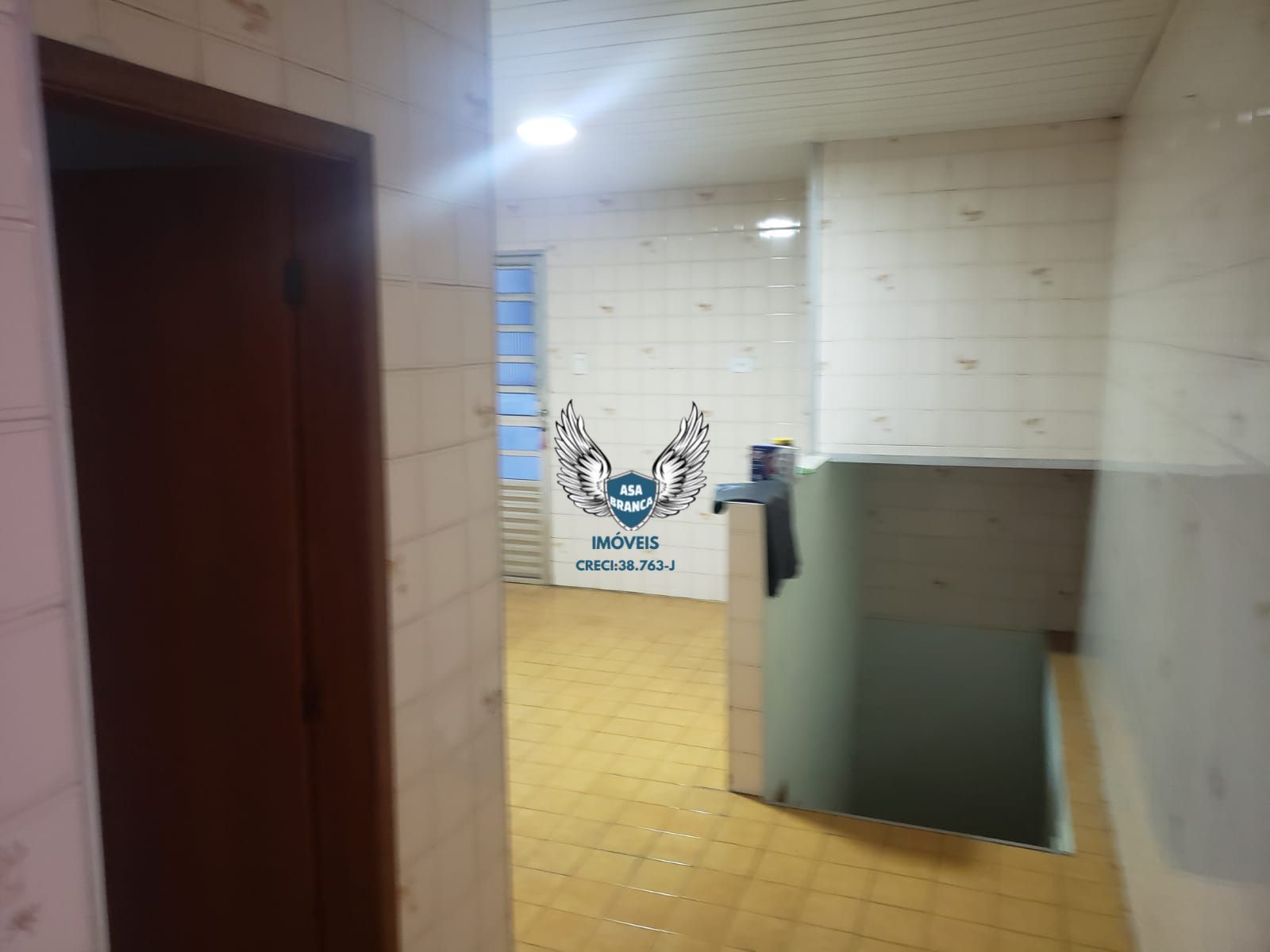 Casa térrea no lauzane com 03 dormitórios e 01 suíte