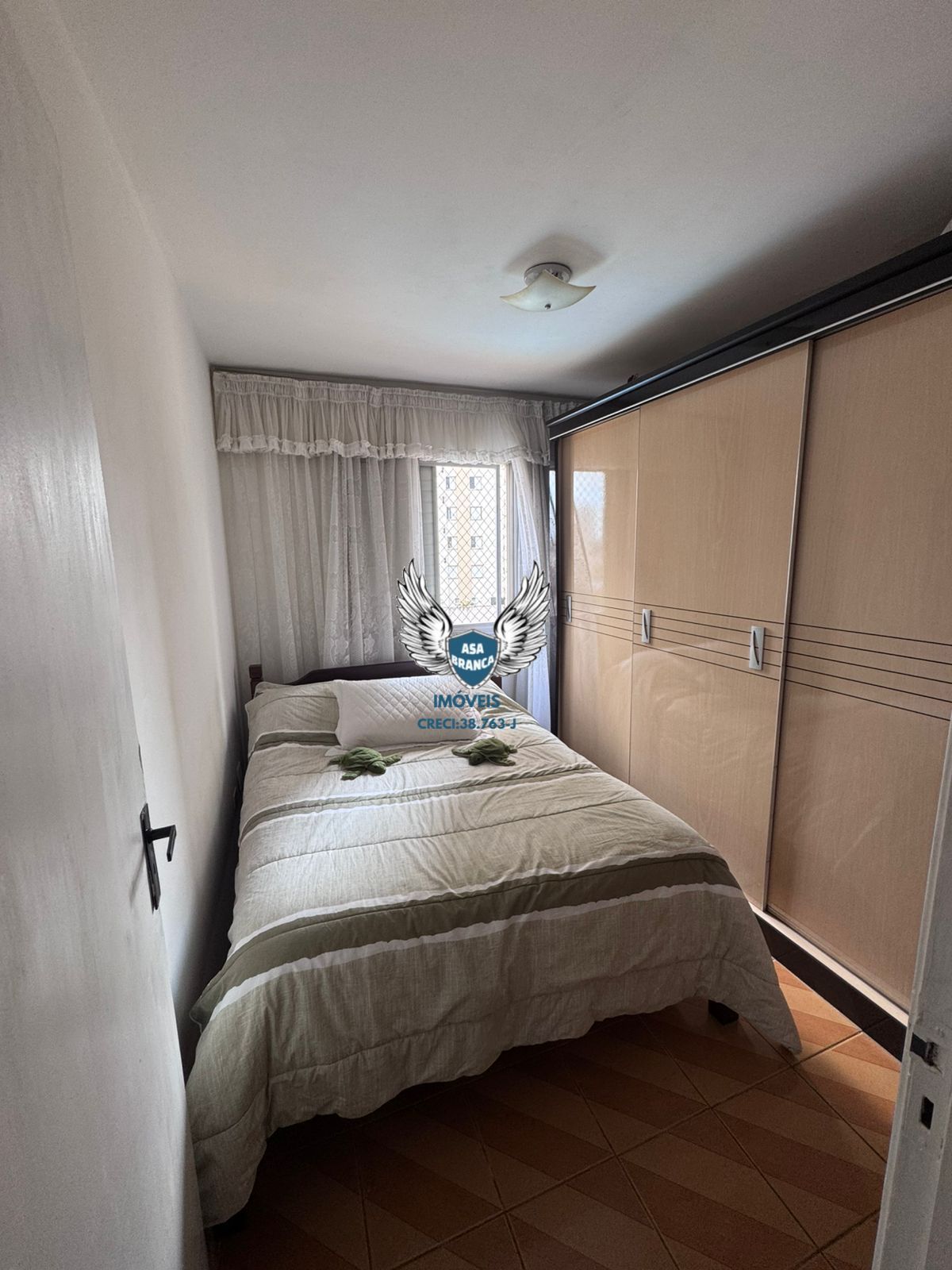 Apartamento com sacada bairro santa terezinha com 02 dormitório e 01 vaga de ga