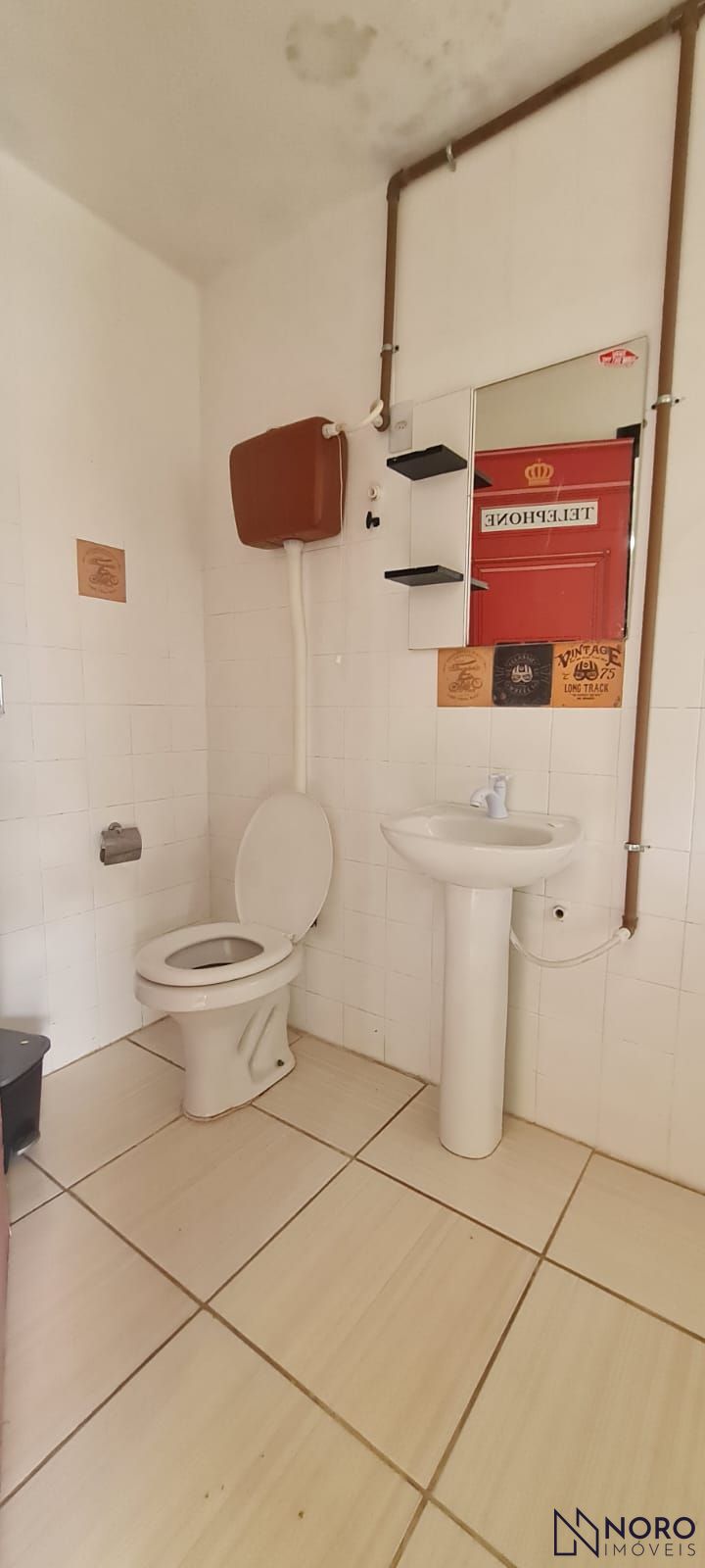 Terreno com casa de 2 dormitórios, edícula e piscina – passo