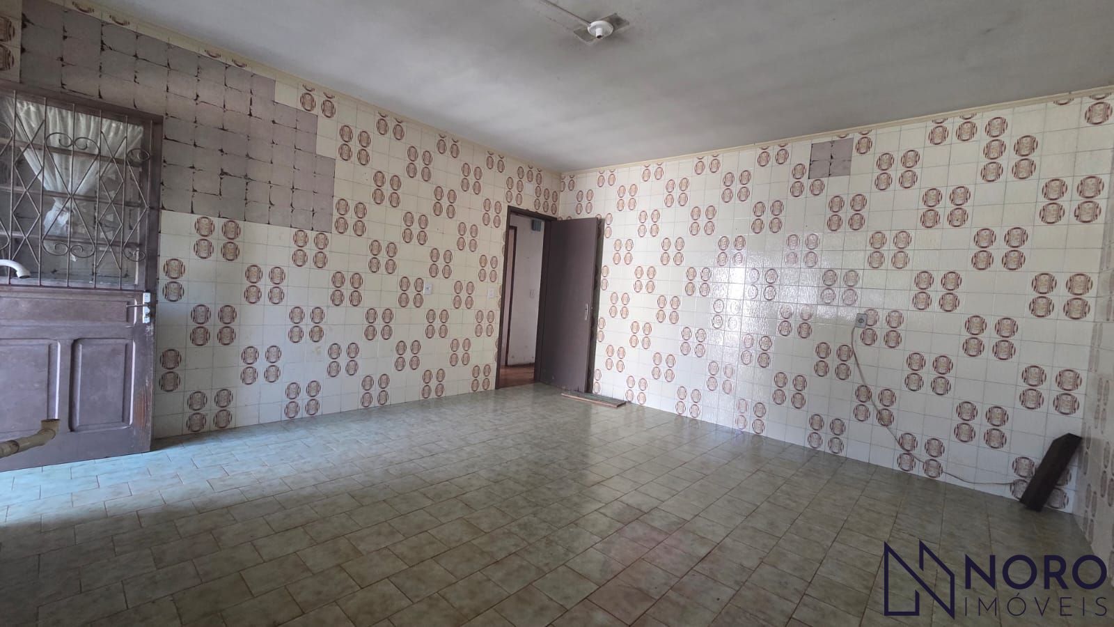 Casa com 3 dormitórios e amplo terreno de 759 m² no Bairro Rosári