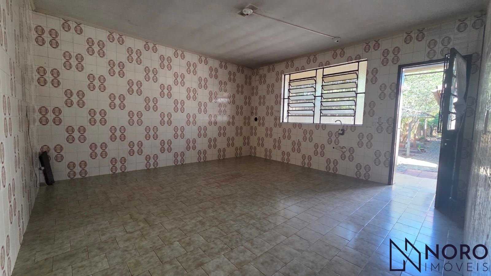 Casa com 3 dormitórios e amplo terreno de 759 m² no Bairro Rosári