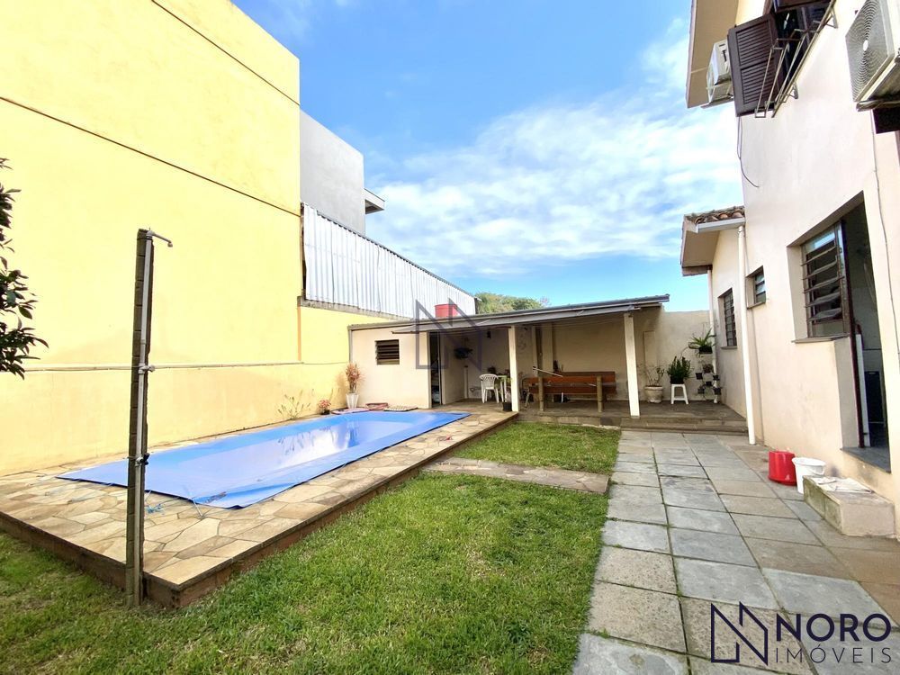 Casa à venda 4 dormitórios, 1 suíte, no Bairro Medianeira