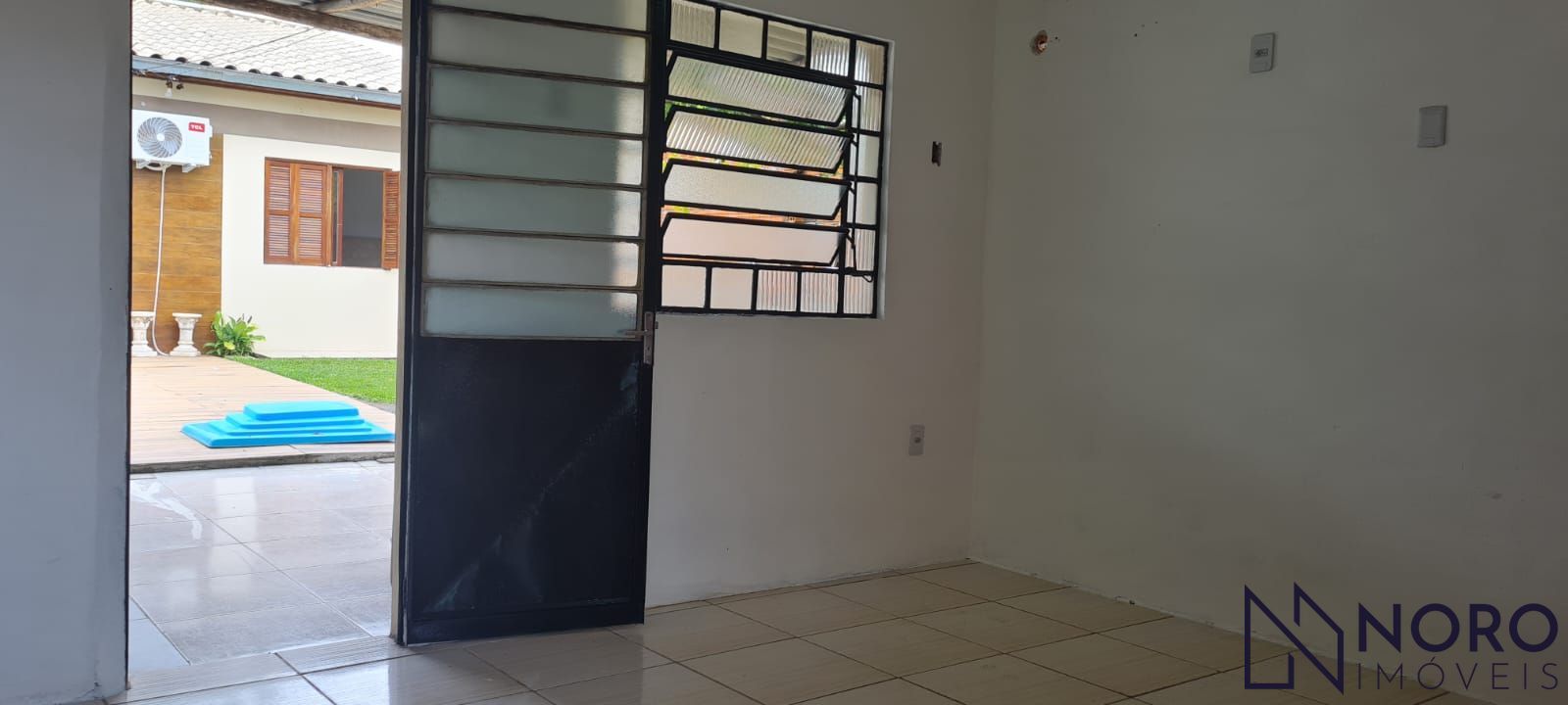 Terreno com casa de 2 dormitórios, edícula e piscina – passo