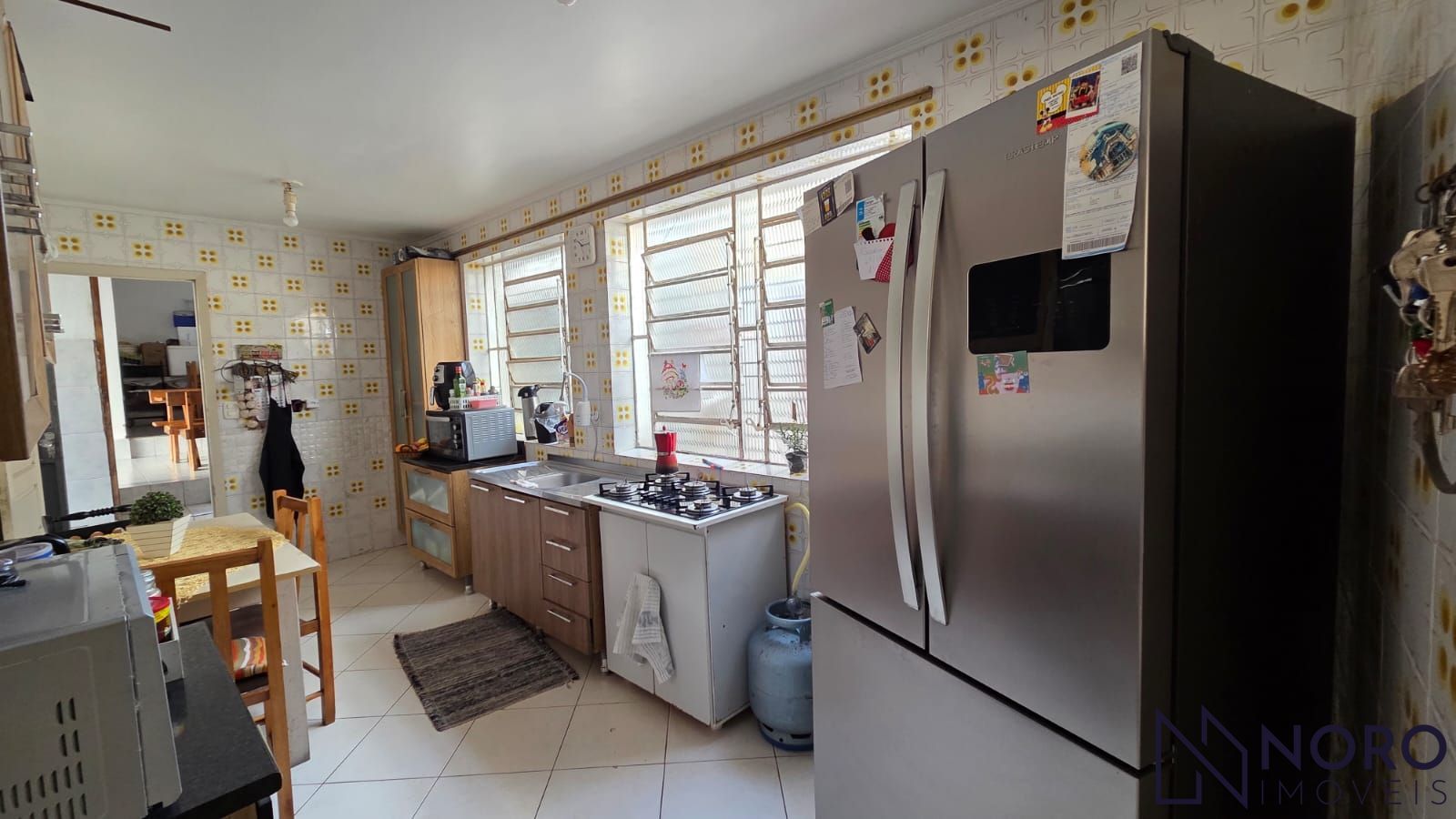 Casa com 3 Dormitórios, Espaço Independente e Garagem à Venda em Região Central