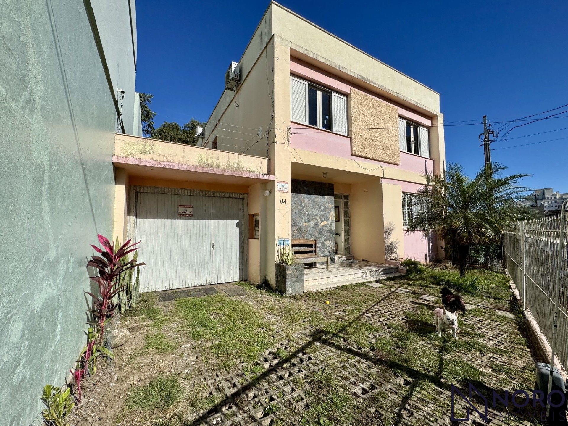 Casa 3 dormitórios (1 suite) 4 vagas na trav. Domingos trevisan-centro