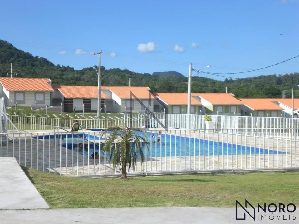 Casa em condomínio fechado 2 dormitórios, espaço gourmet, garagem 2 carros, co