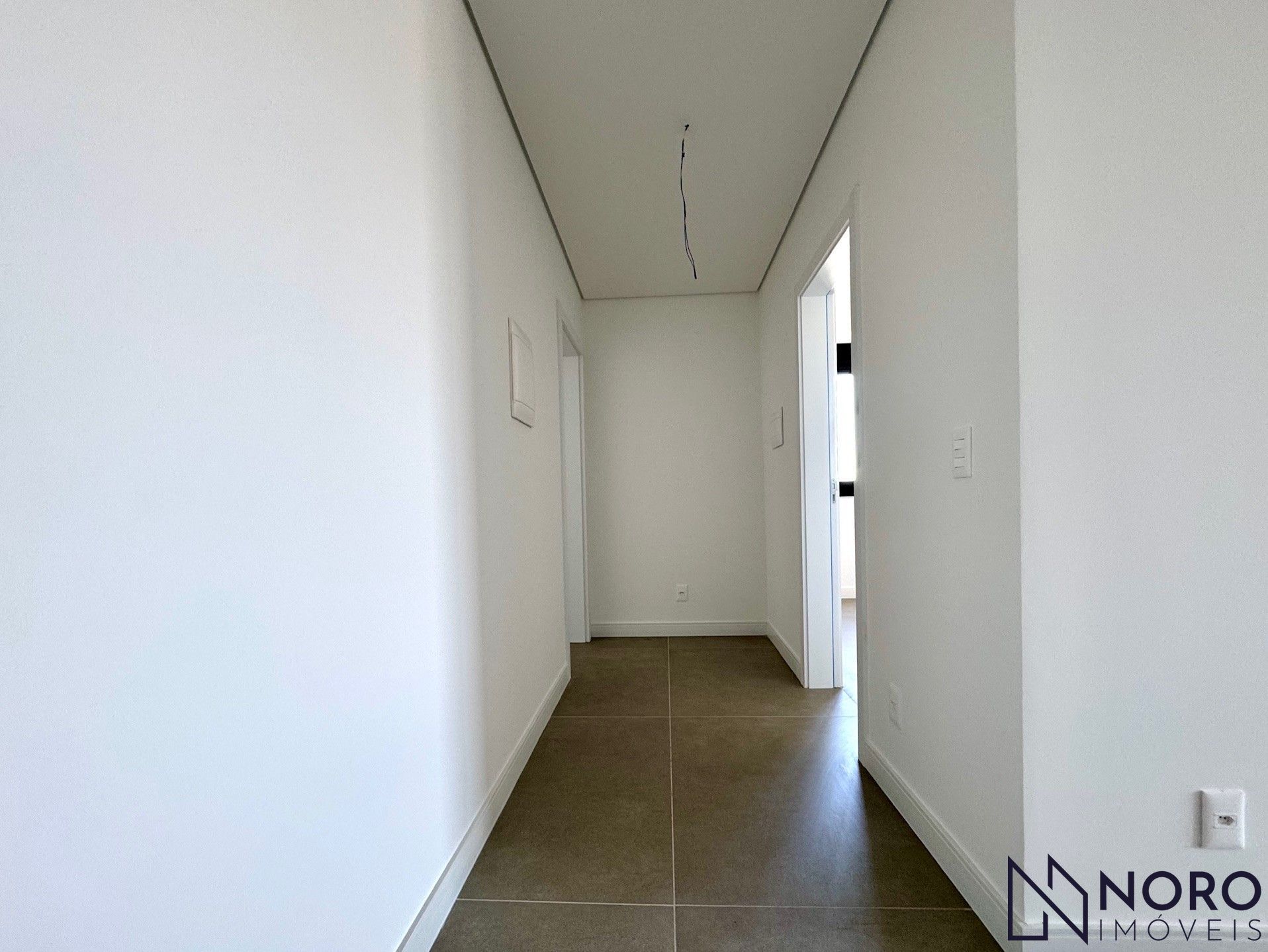 Apartamento 2 suítes living 2 ambientes cozinha integrada 2 box para camionetas