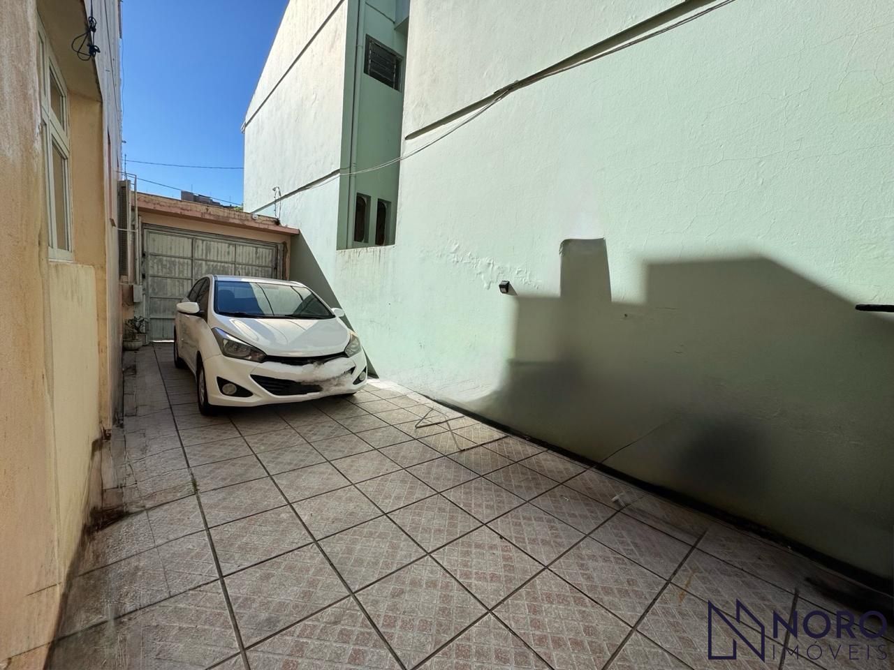 Casa 3 dormitórios (1 suite) 4 vagas na trav. Domingos trevisan-centro
