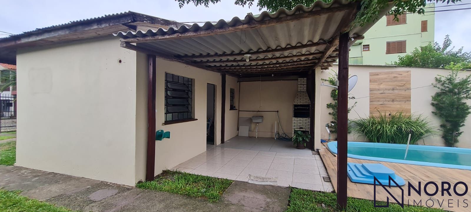 Terreno com casa de 2 dormitórios, edícula e piscina – passo