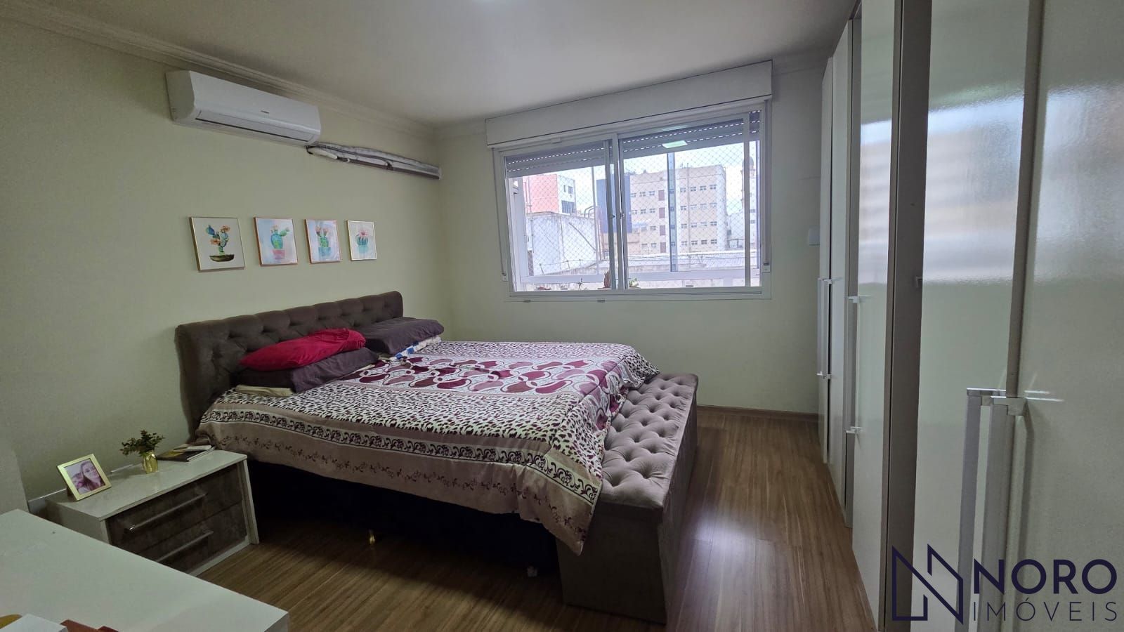 Apartamento semimobiliado com 2 dormitórios e suíte próximo à UFN