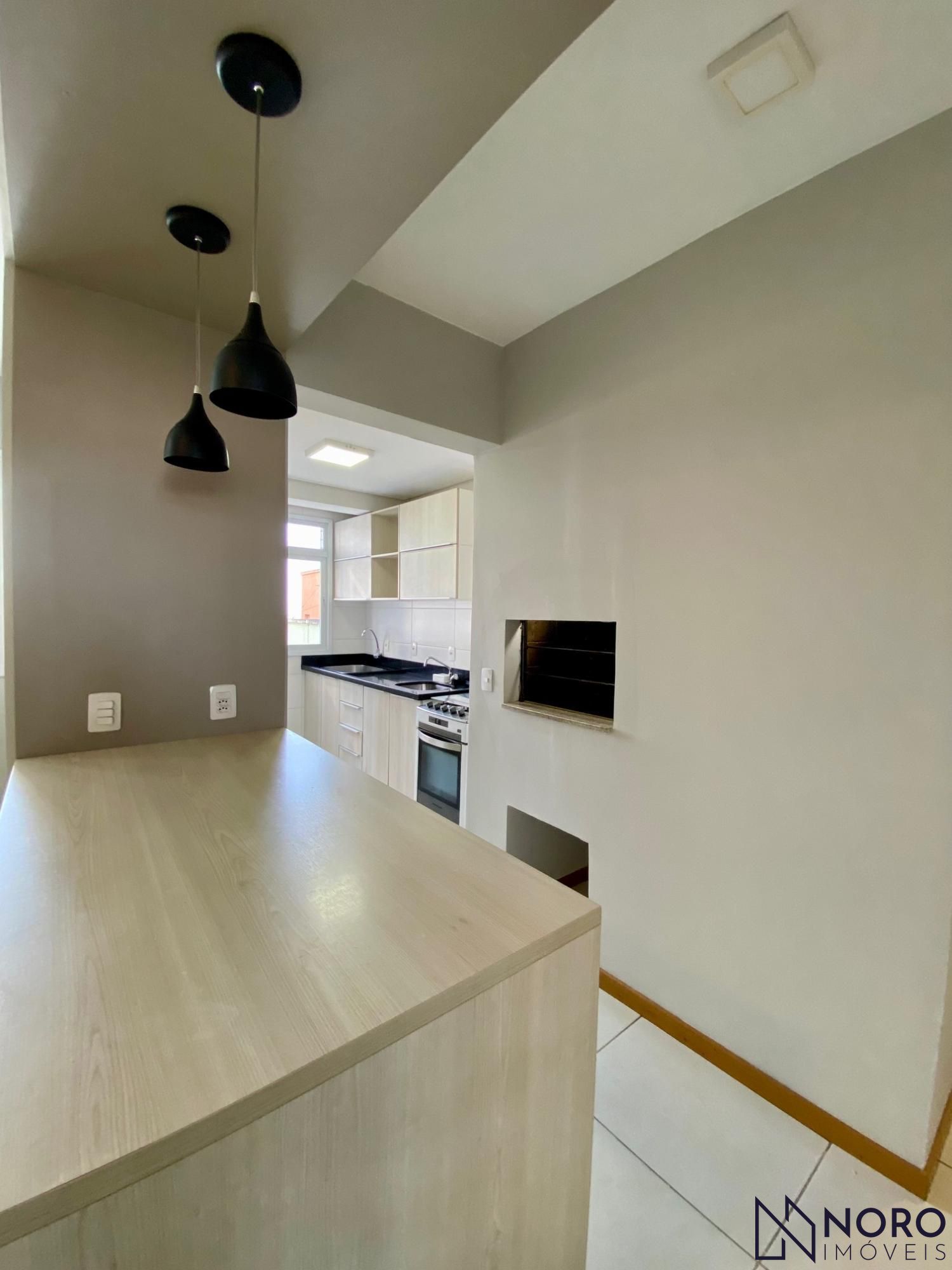 Apartamento dois dormitórios, suíte, semimobiliado com garagem, no bairro Nossa